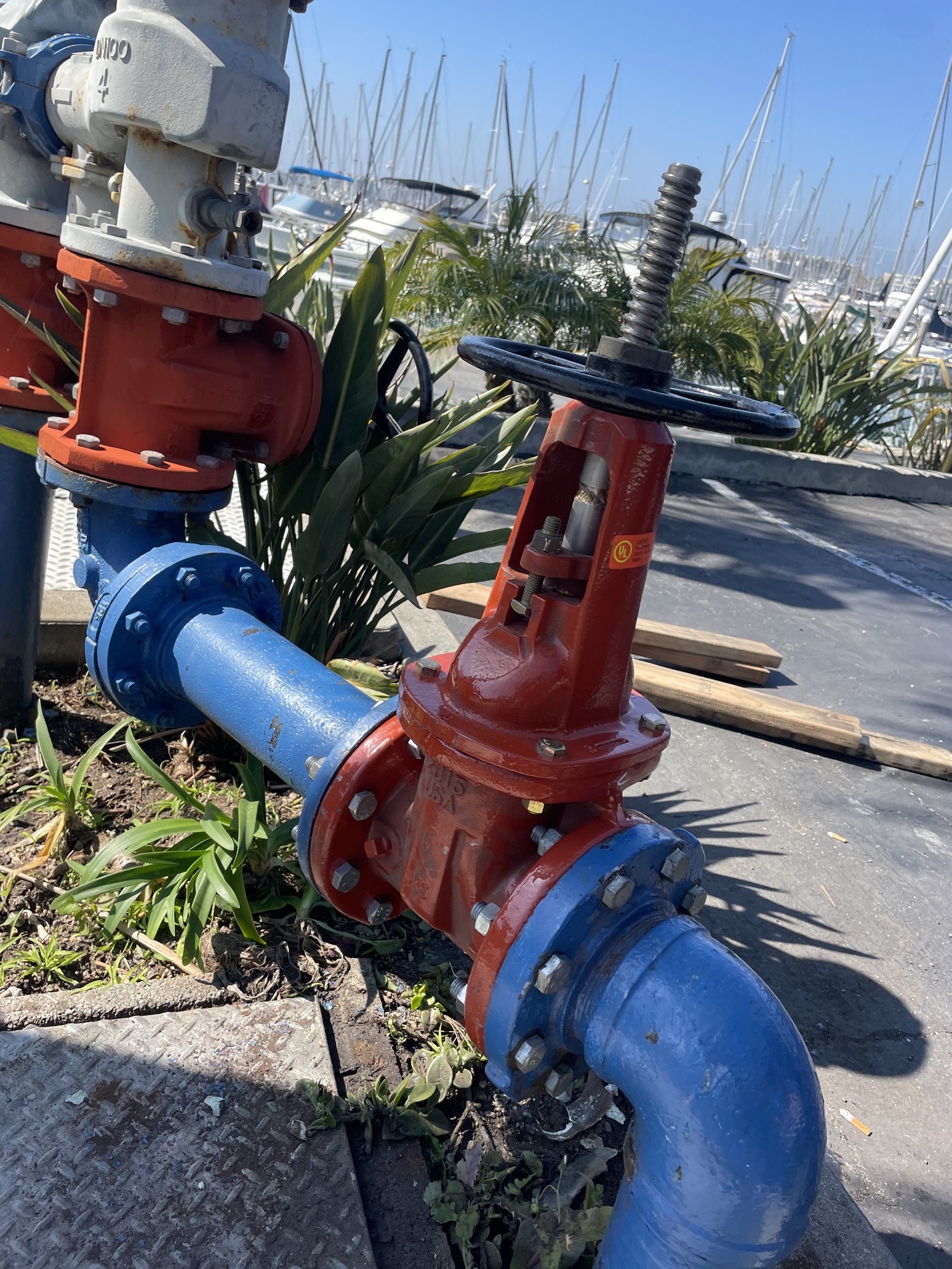 California Coast Plumbers performing backflow testing at a commercial facility